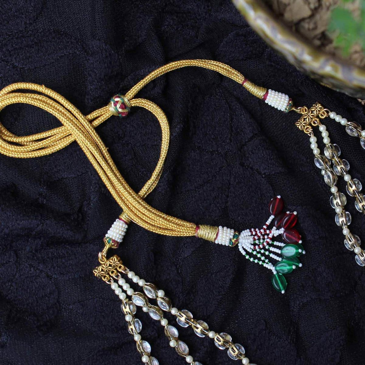 Kundan choker set in gold-tone with matching earrings and long bridal necklace, perfect for wedding functions , festive and bridal wear