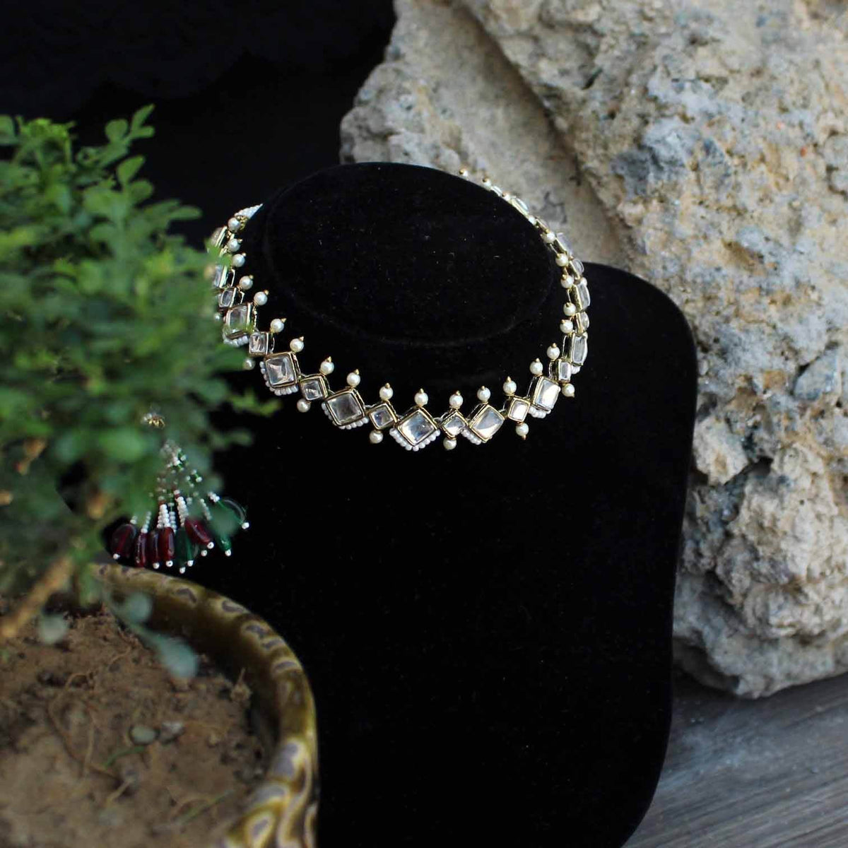 Kundan choker set in gold-tone with matching earrings and long bridal necklace, perfect for wedding functions , festive and bridal wear