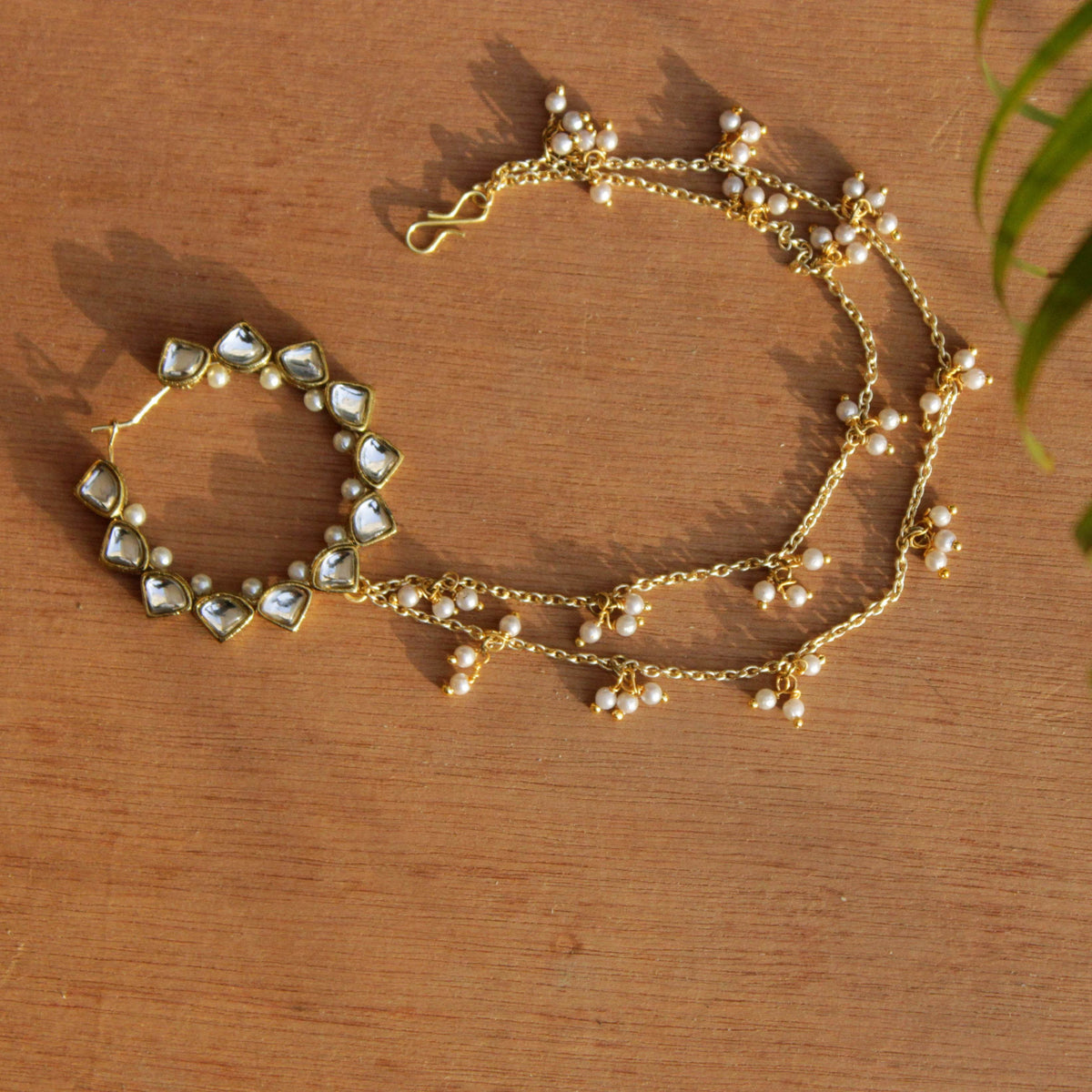 Traditional Indian bridal nath with kundan stones, green beads, and pearl hair chain Indian Nathiya Nathani Nose Ring