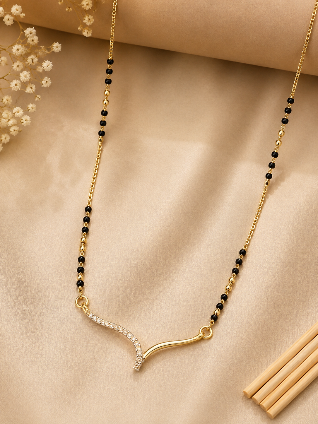 gold-wave-cz-mangalsutra-anti-tarnish-stainless-steel-black-bead-necklace-for-women