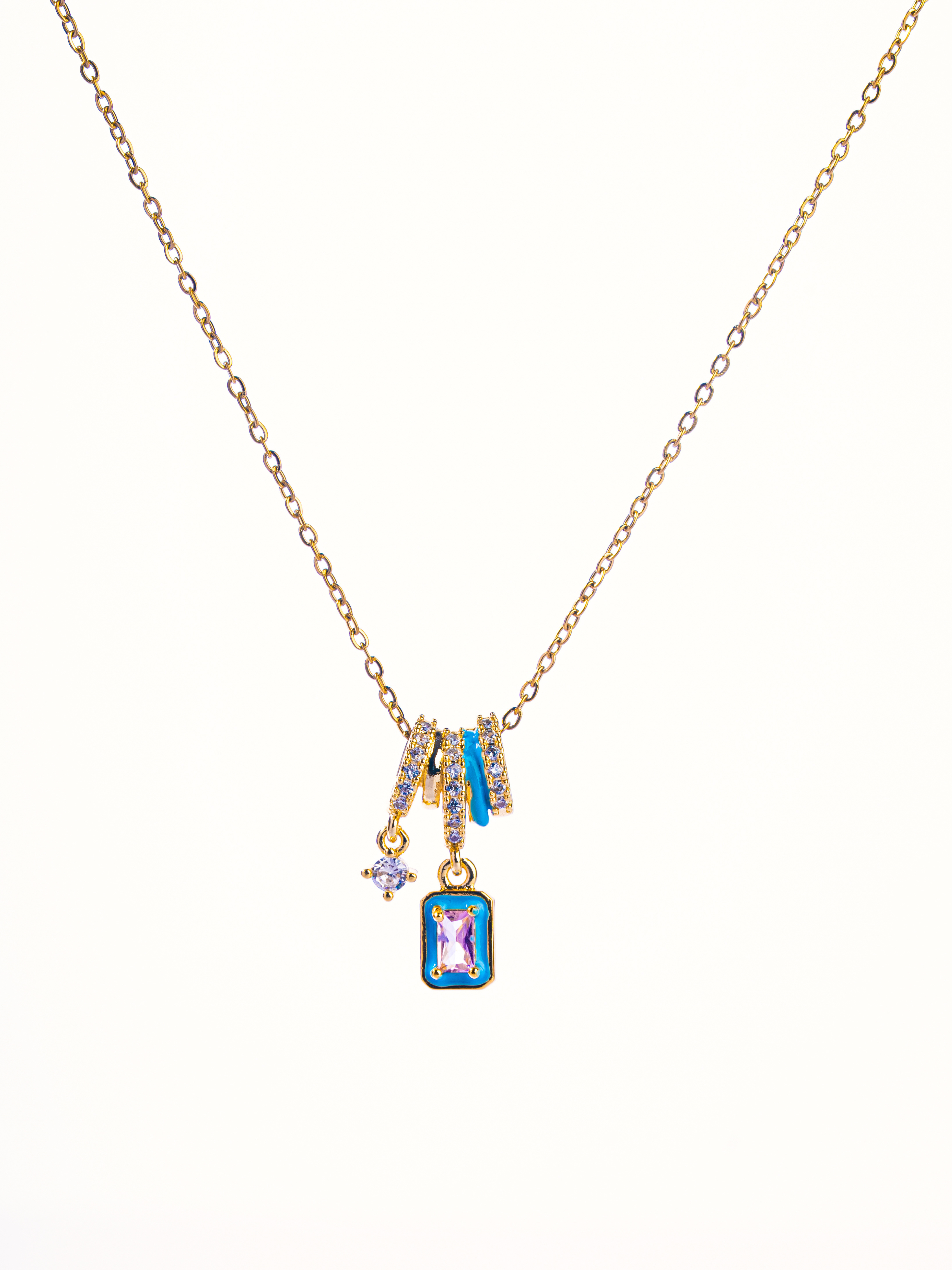 Close-up of Pastel Bloom necklace �? delicate pastel charms on gold-plated chain, elegant for everyday wear.