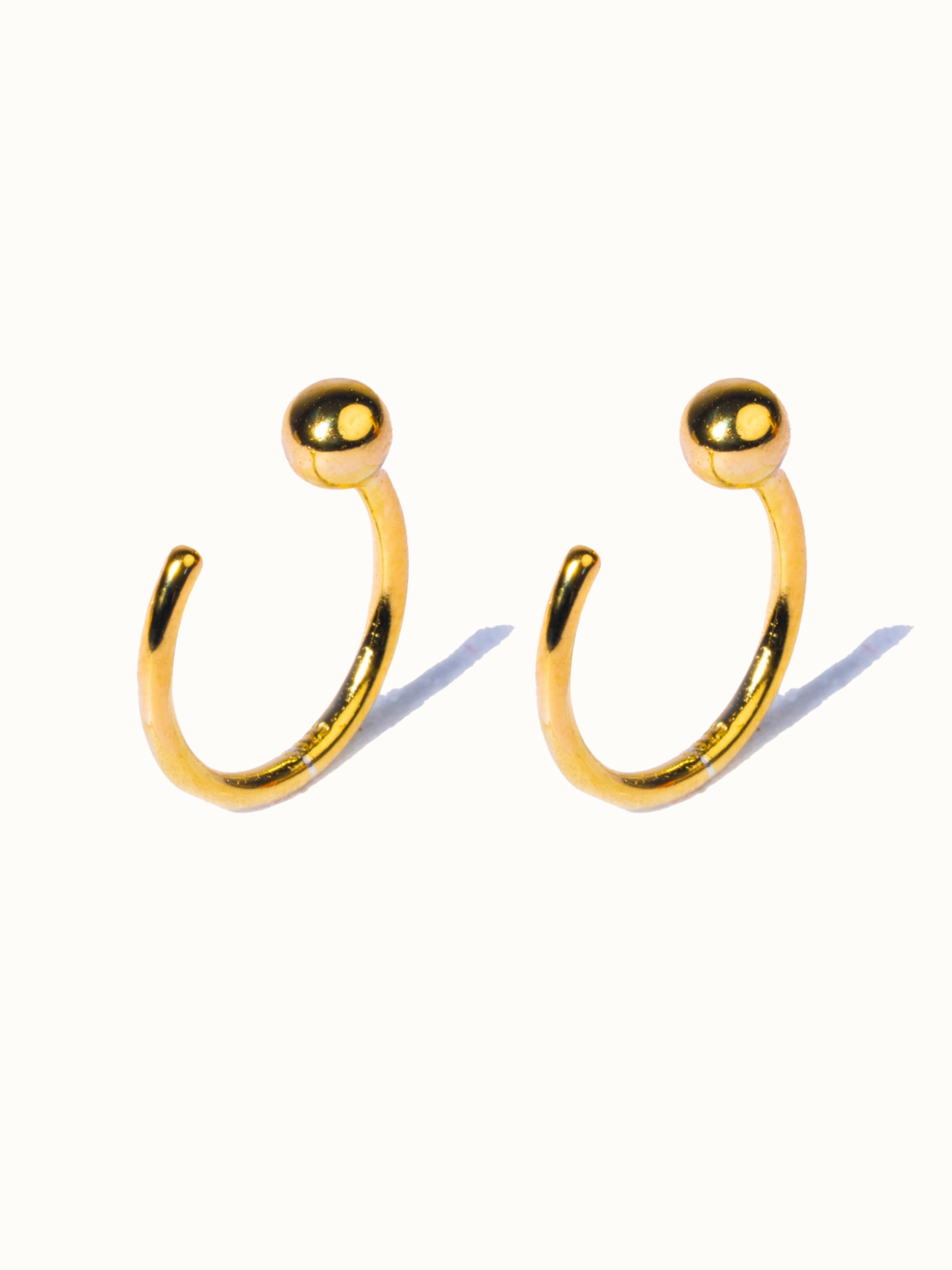 925 sterling silver ball hoop earrings �? poke-free hypoallergenic hoops, anti-tarnish and waterproof. Sleep-safe for kids and gentle for sensitive ears.