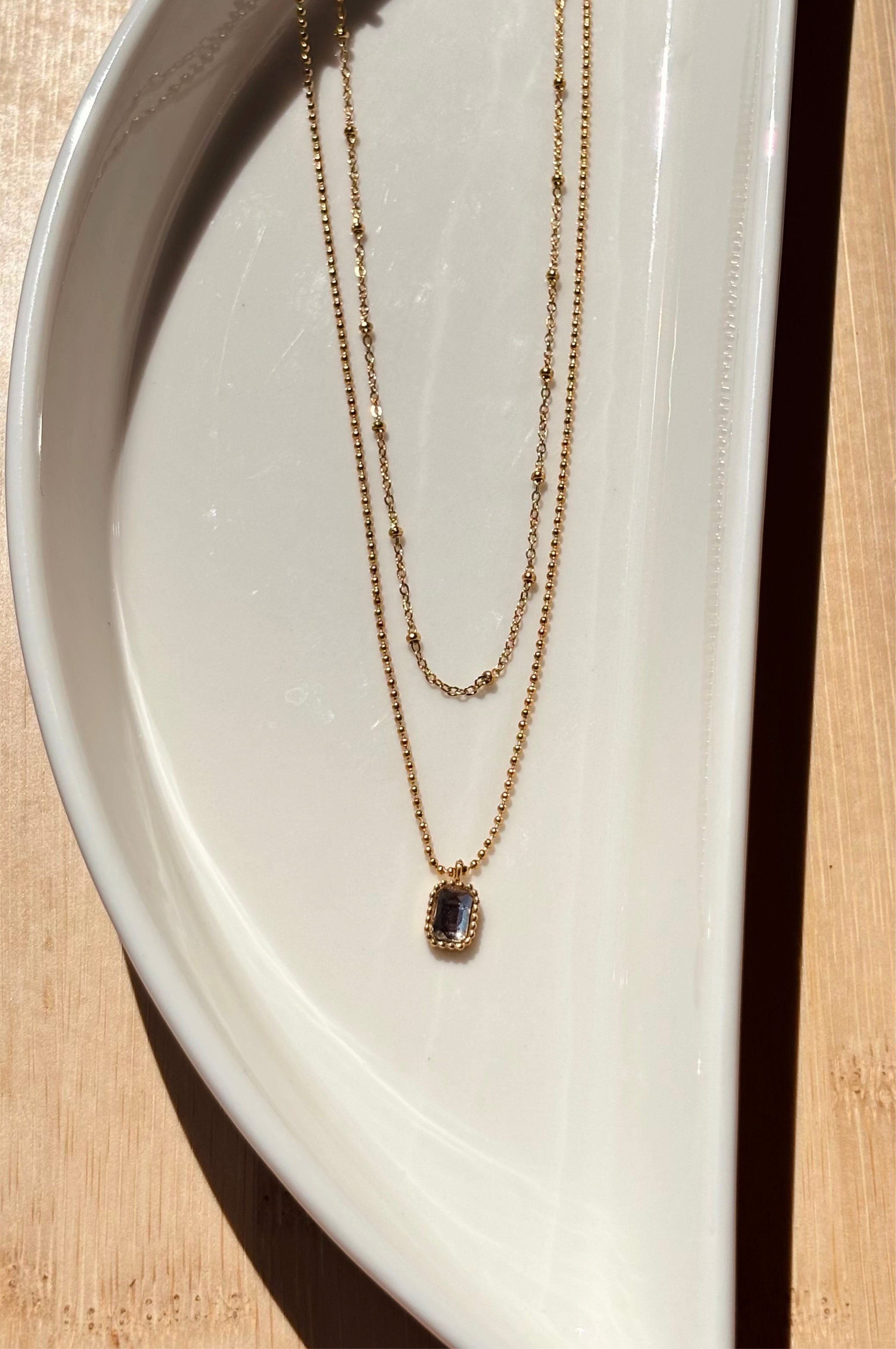 Double layer chain necklace styled flat �? 18k gold-plated elegant chain necklace for casual and gifting.