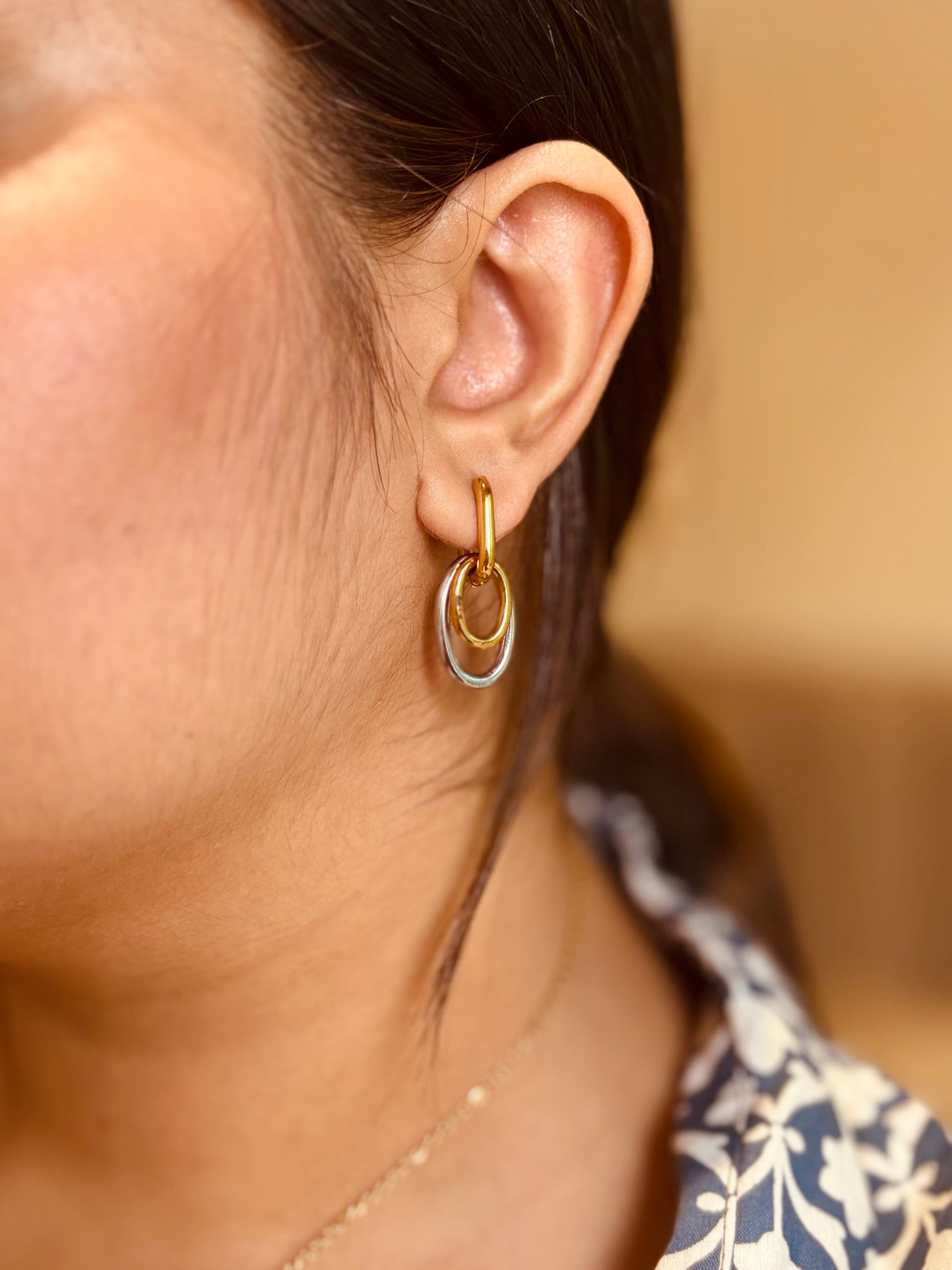 Manya drops styled flat �? 18k gold-plated mixed metal versatile drop earrings for everyday and evening.