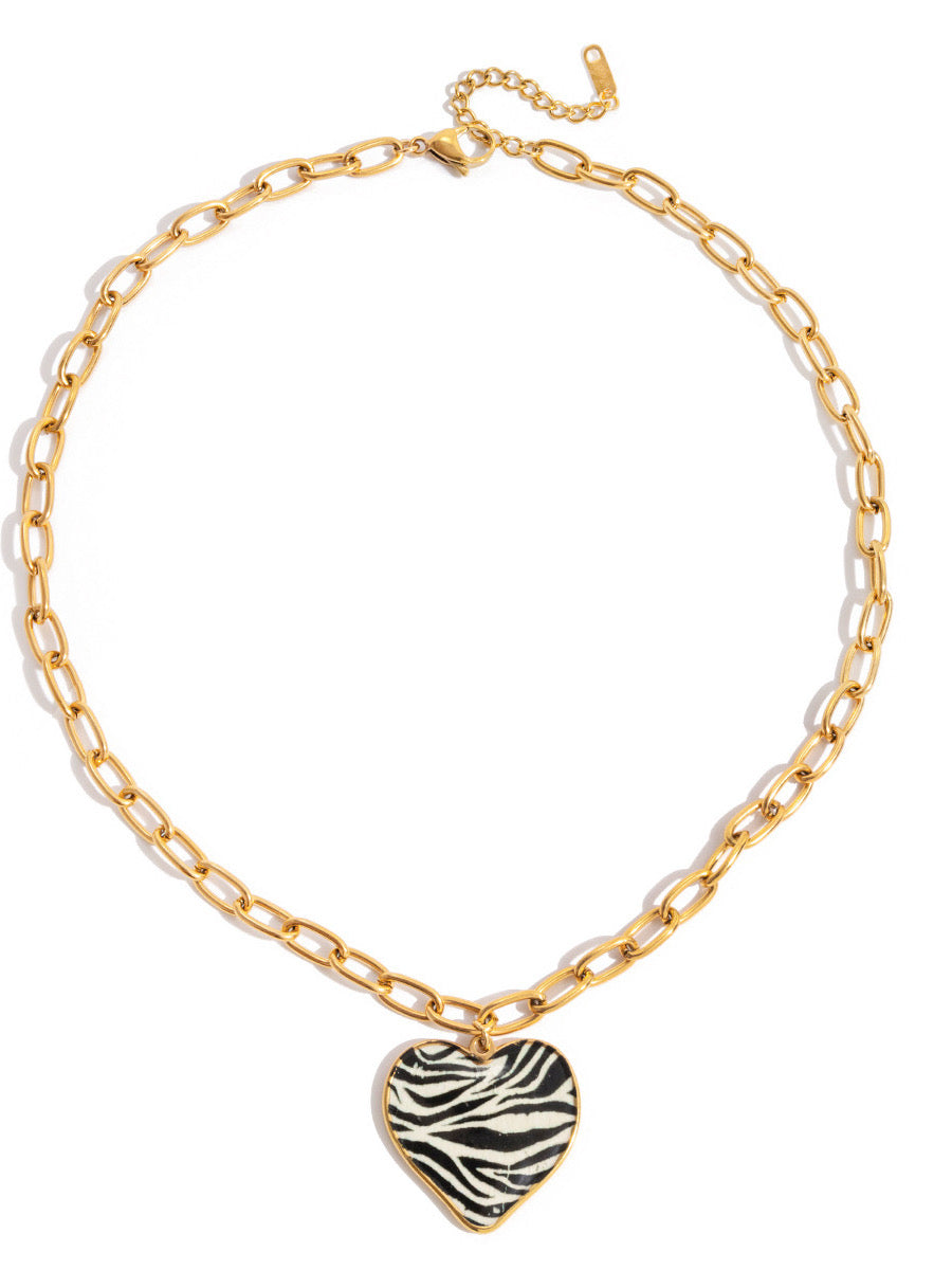 18k gold-plated zebra heart pendant necklace �? bold statement zebra pattern heart necklace, anti-tarnish and waterproof for evening looks.