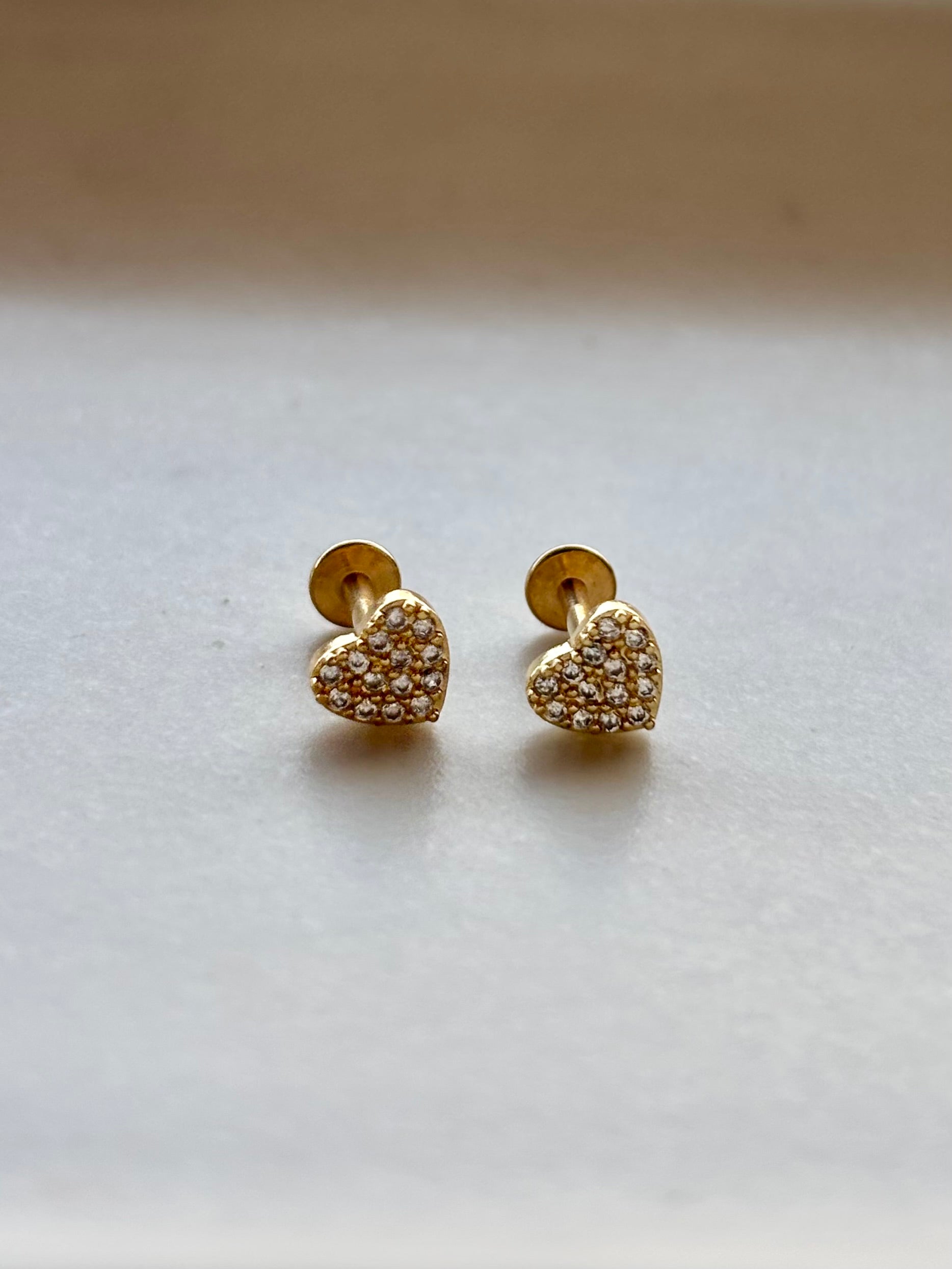 18k gold-plated heart flat-back stud earrings �? minimal modern sleek hypoallergenic heart studs, anti-tarnish and waterproof for everyday wear.