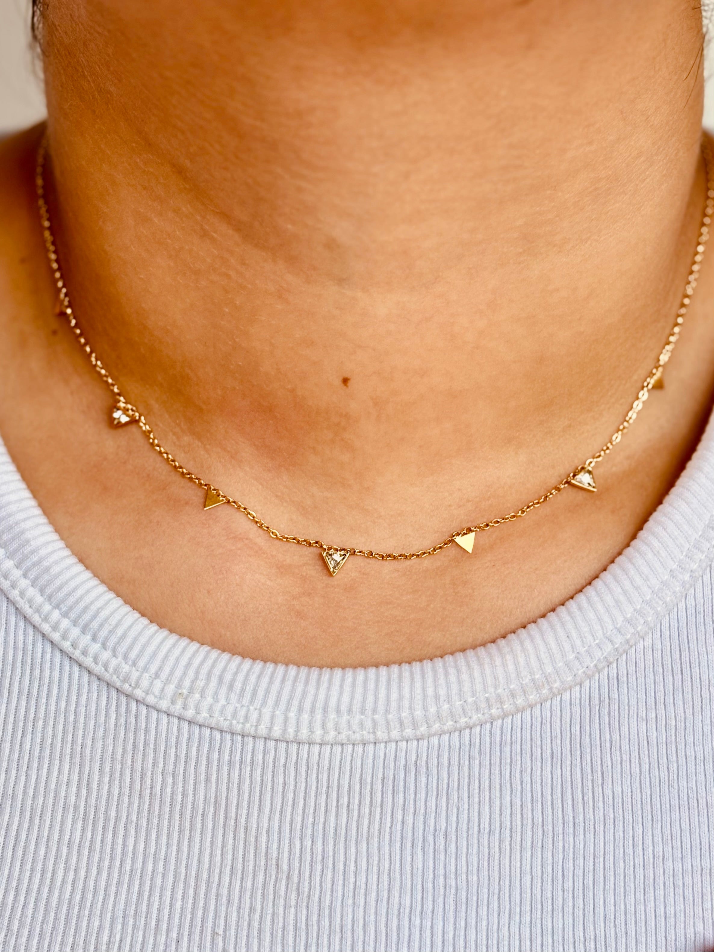 Claire gold-plated triangle stone choker styled flat �? elegant statement necklace for everyday and festive.