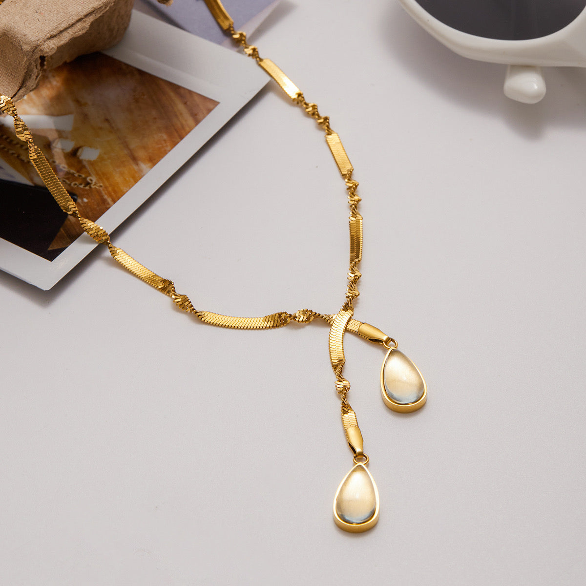 Styled view of Vila lariat necklace �? 18k gold-plated lariat for evening and gifting.
