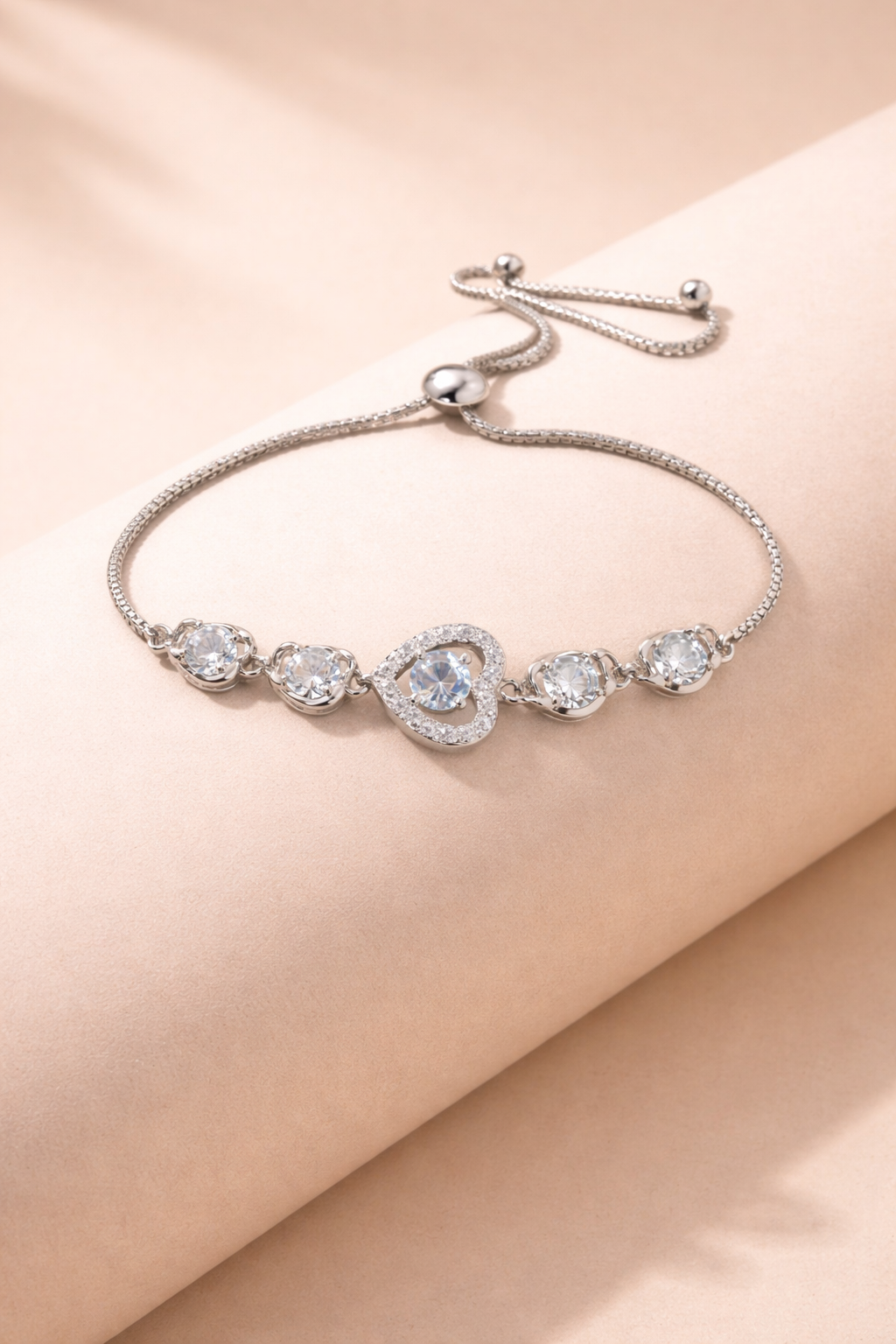 astria-jewellery-silver-plated-heart-crystal-bracelet-for-women-zircon-studded-love-charm-chain-elegant-daily-party-wear-jewellery