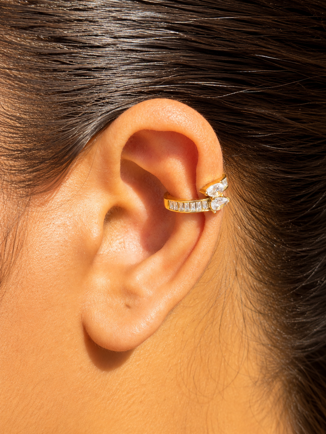 18k gold-plated Riya statement ear cuff �? anti-tarnish, waterproof, hypoallergenic, lightweight no-piercing single-piece cuff.