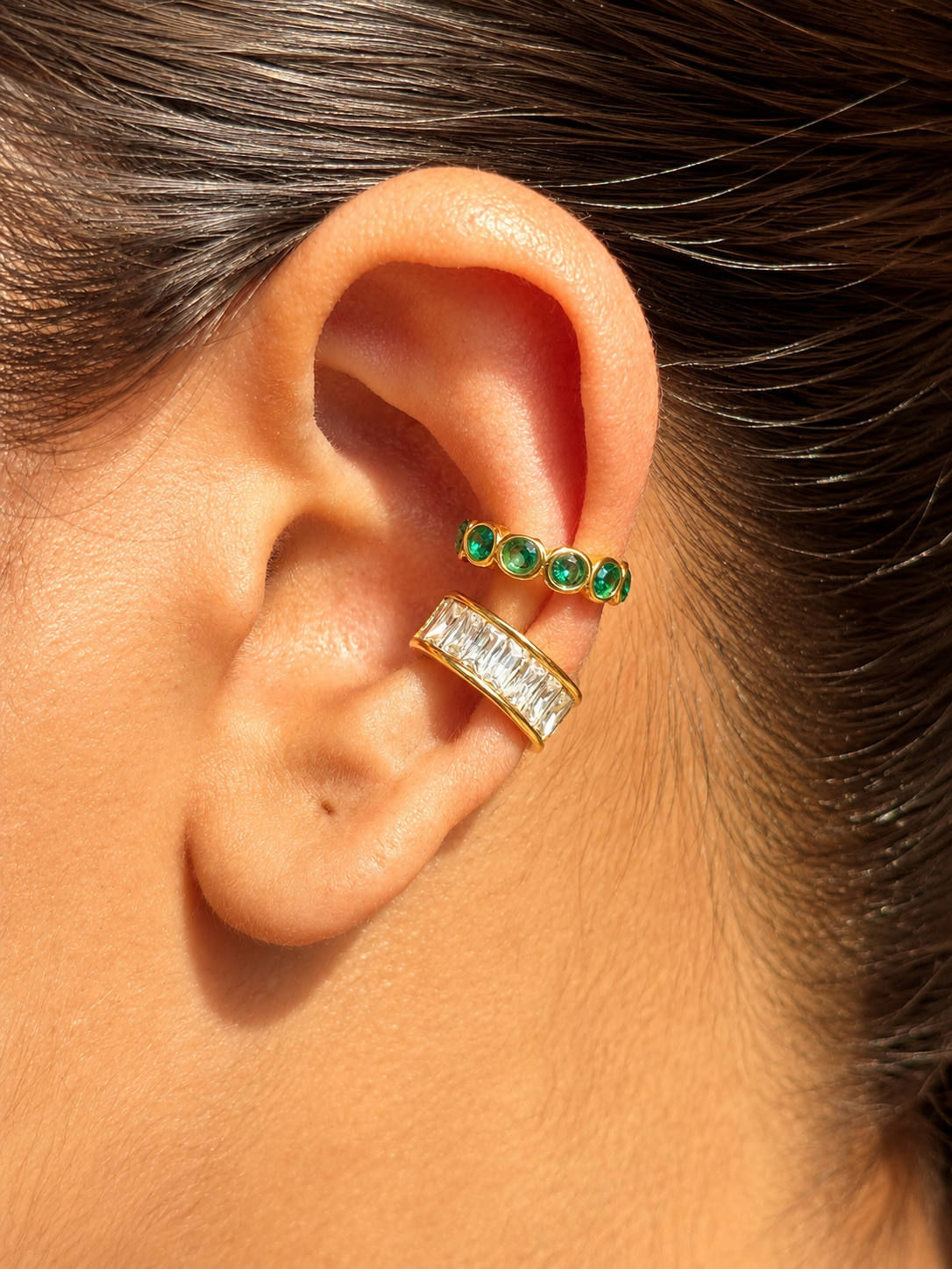 Close-up of Inara gold-plated ear cuff �? sleek 18k gold-plated no-piercing single-piece cuff for daily wear.