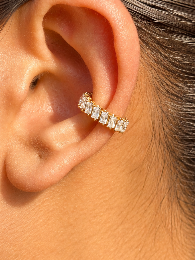 Nyra gold statement ear cuff styled for festive looks �? no-piercing single-piece cuff for evening and wedding occasions.