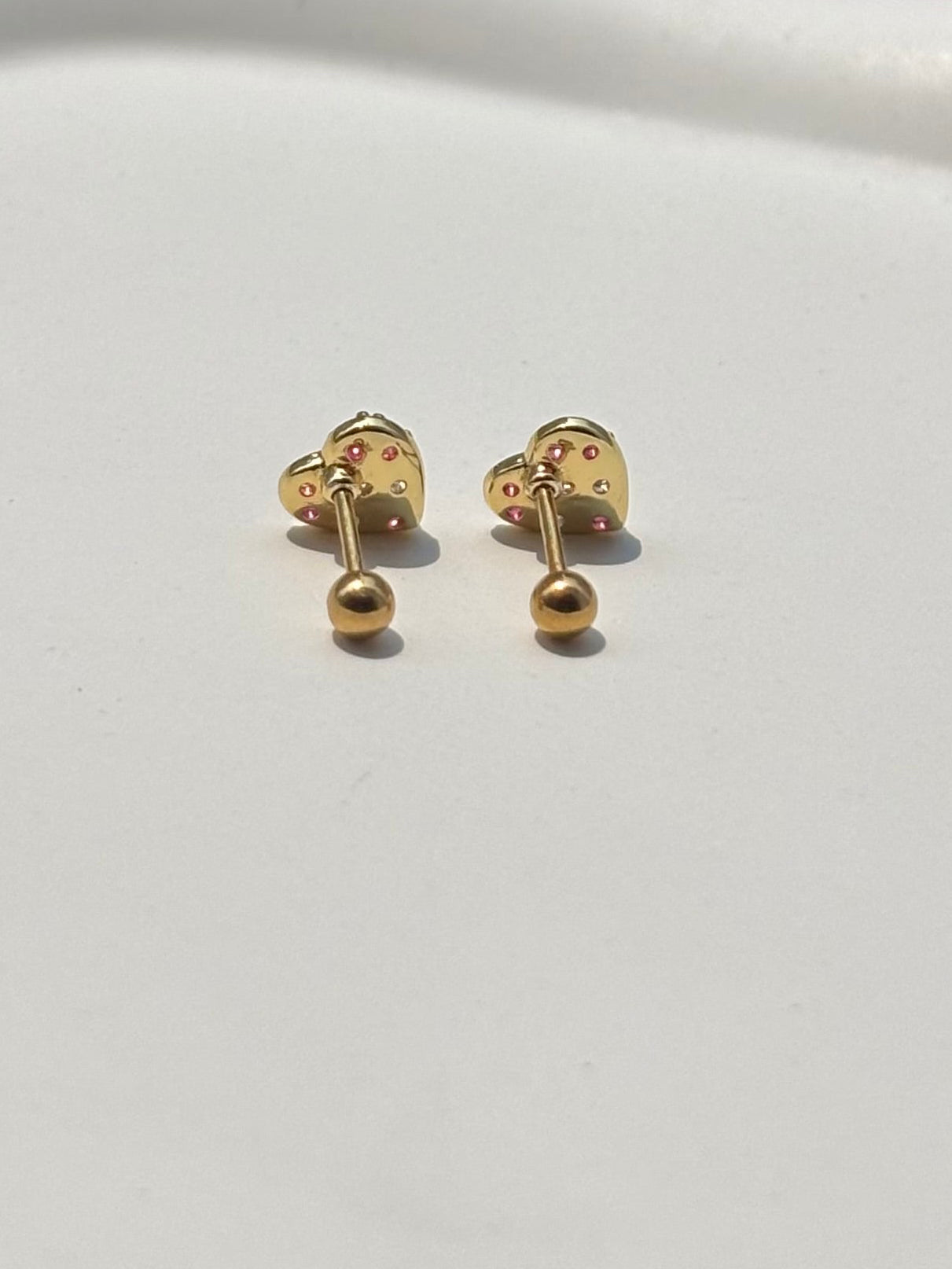 Pair of colourful heart ball-back studs �? 18k gold-plated playful heart stud earrings for everyday styling and gifting.