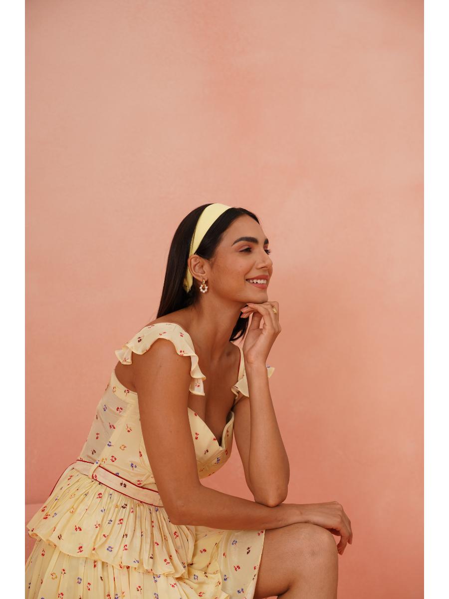 Styled view of Alina pearl drop earrings �? 18k gold-plated timeless pearl drops for evening and casual wear.