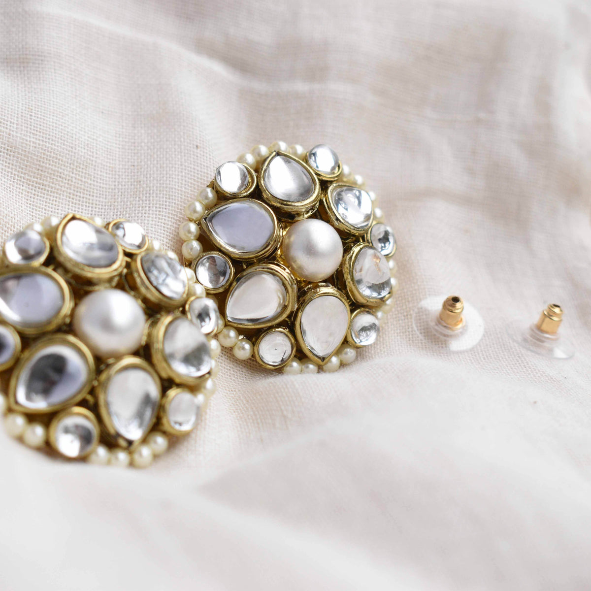 Traditional Kundan earrings in gold-tone, perfect for weddings and festive wear