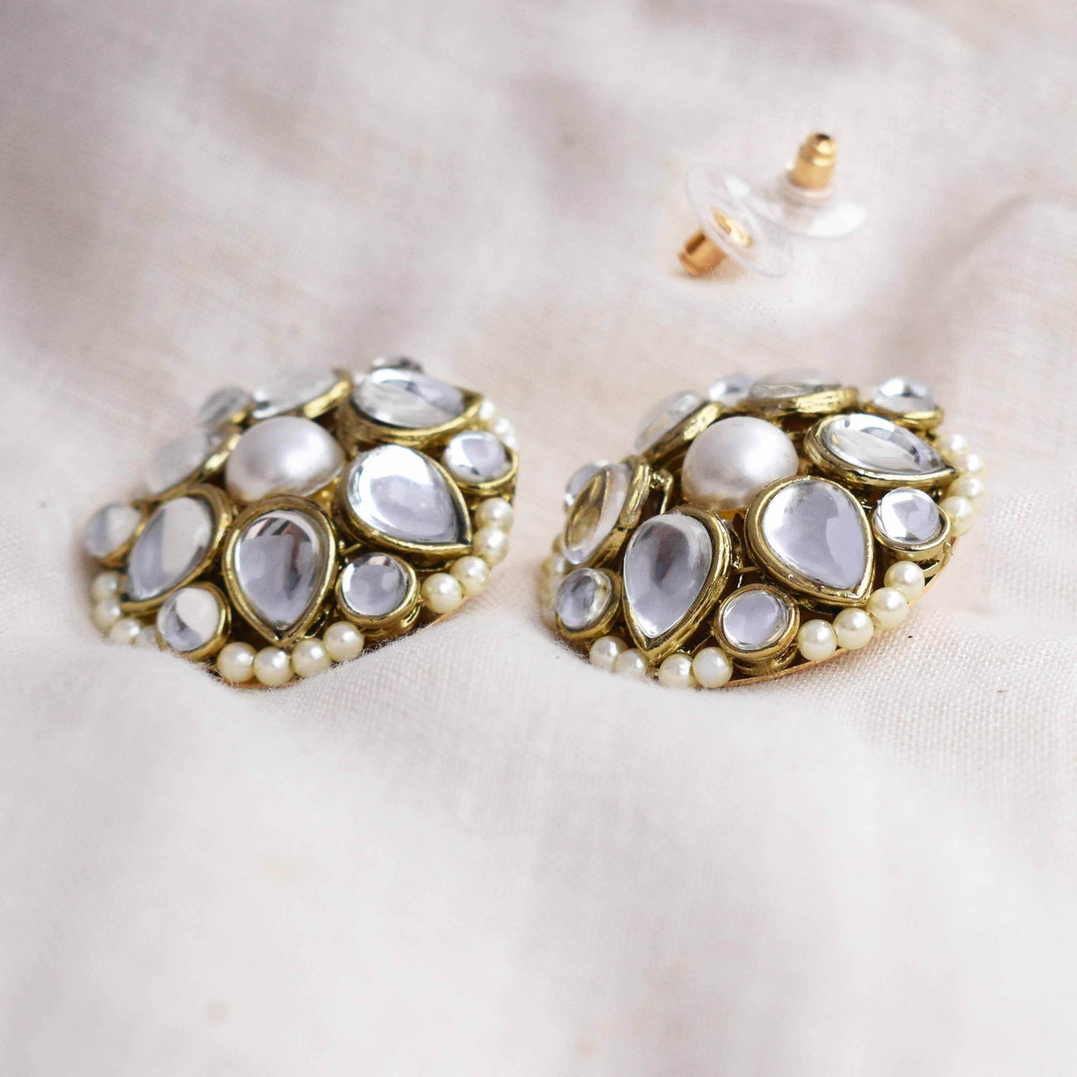 Traditional Kundan earrings in gold-tone, perfect for weddings and festive wear