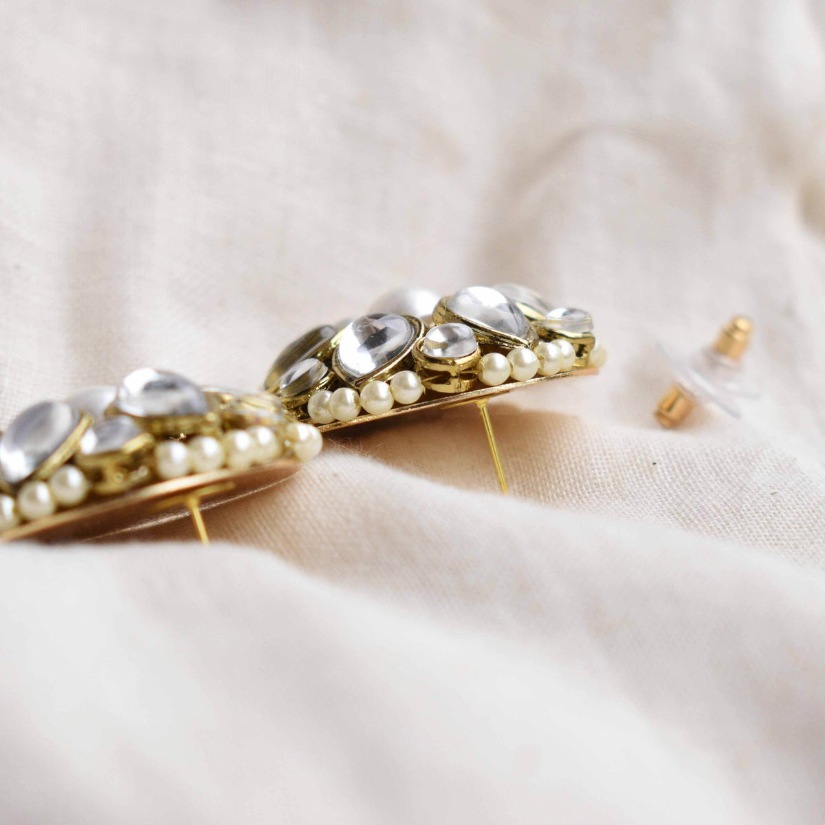 Traditional Kundan earrings in gold-tone, perfect for weddings and festive wear