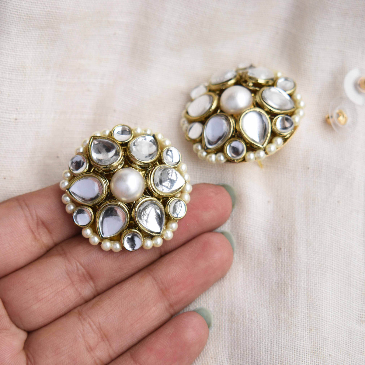 Traditional Kundan earrings in gold-tone, perfect for weddings and festive wear