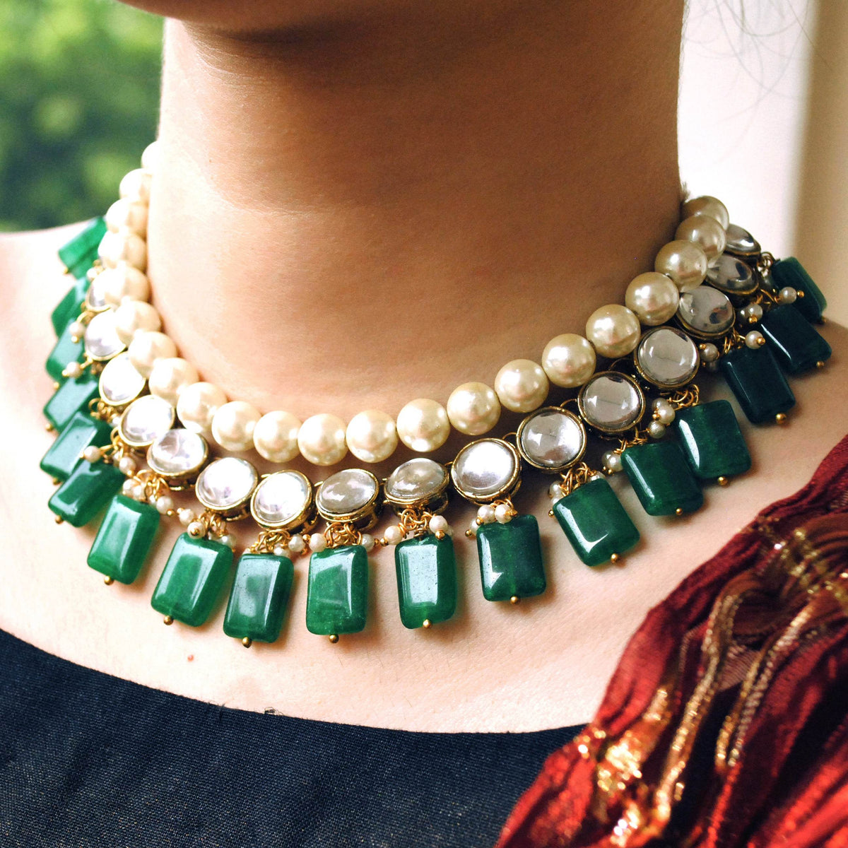 Kundan choker set in gold-tone with matching earrings and long bridal necklace, perfect for wedding functions , festive and bridal wear