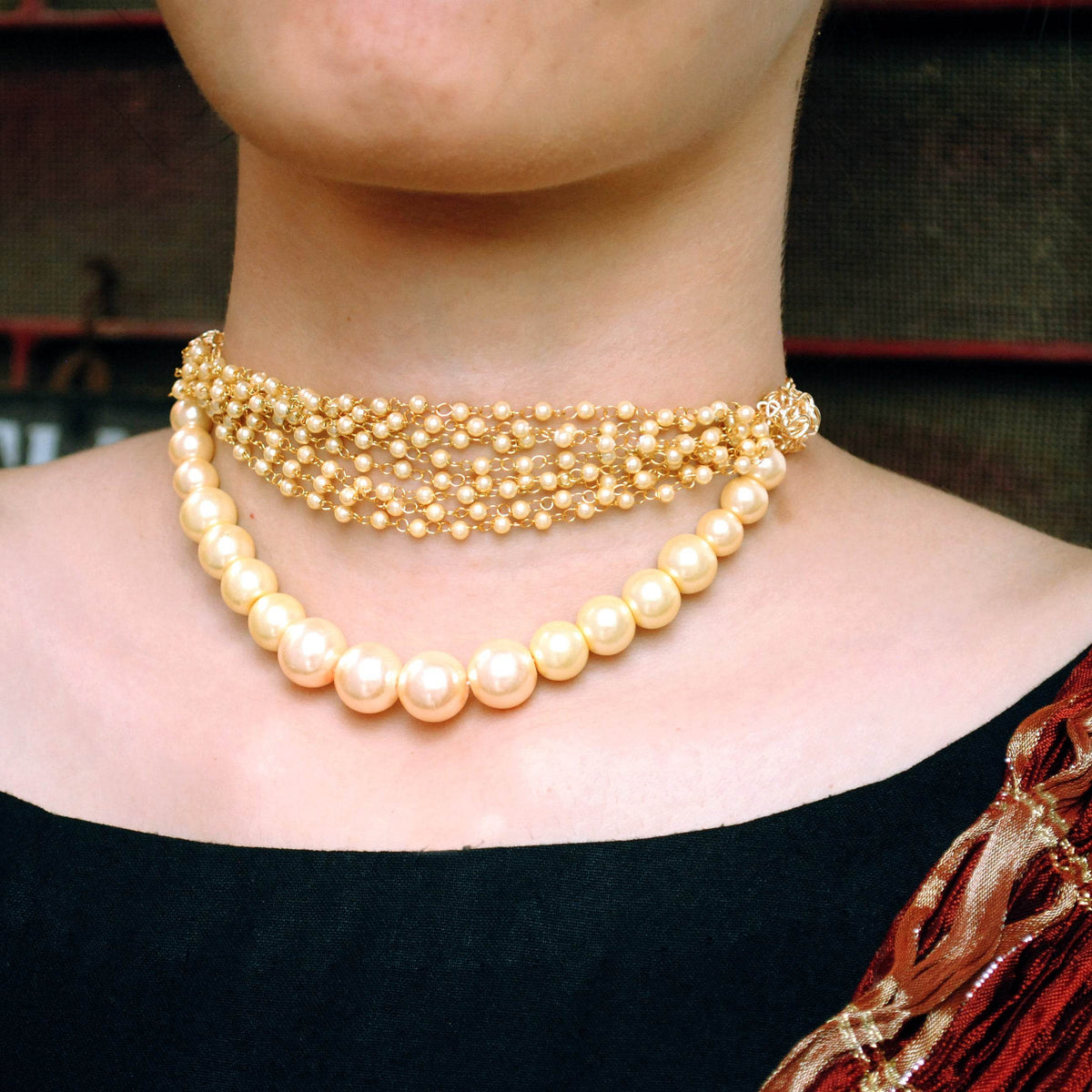 Kundan choker set in gold-tone with matching earrings and long bridal necklace, perfect for wedding functions , festive and bridal wear