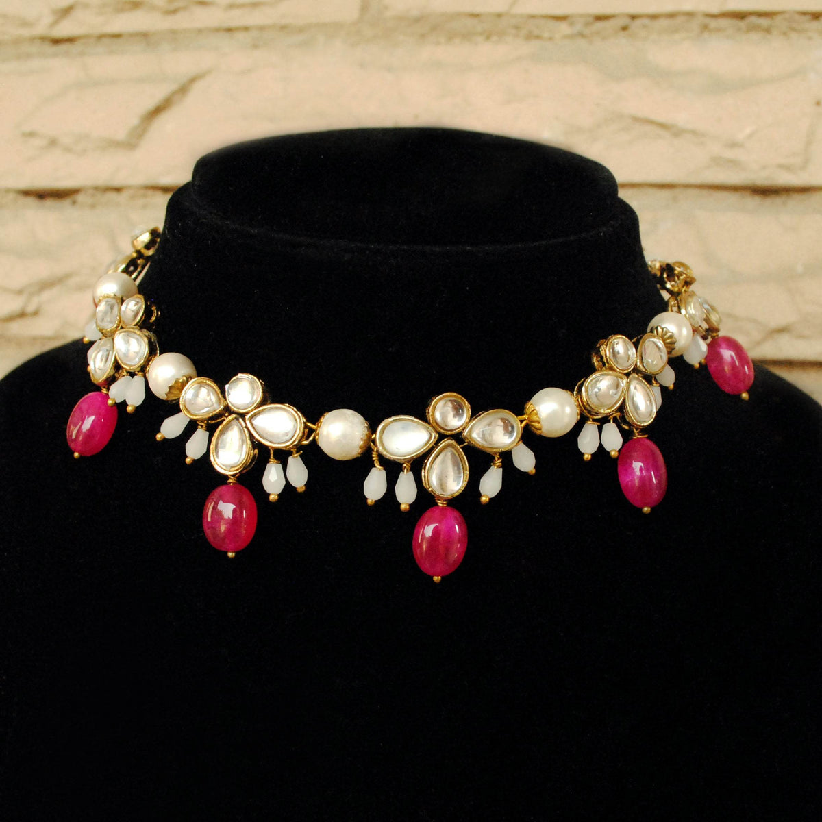 Kundan choker set in gold-tone with matching earrings and long bridal necklace, perfect for wedding functions , festive and bridal wear