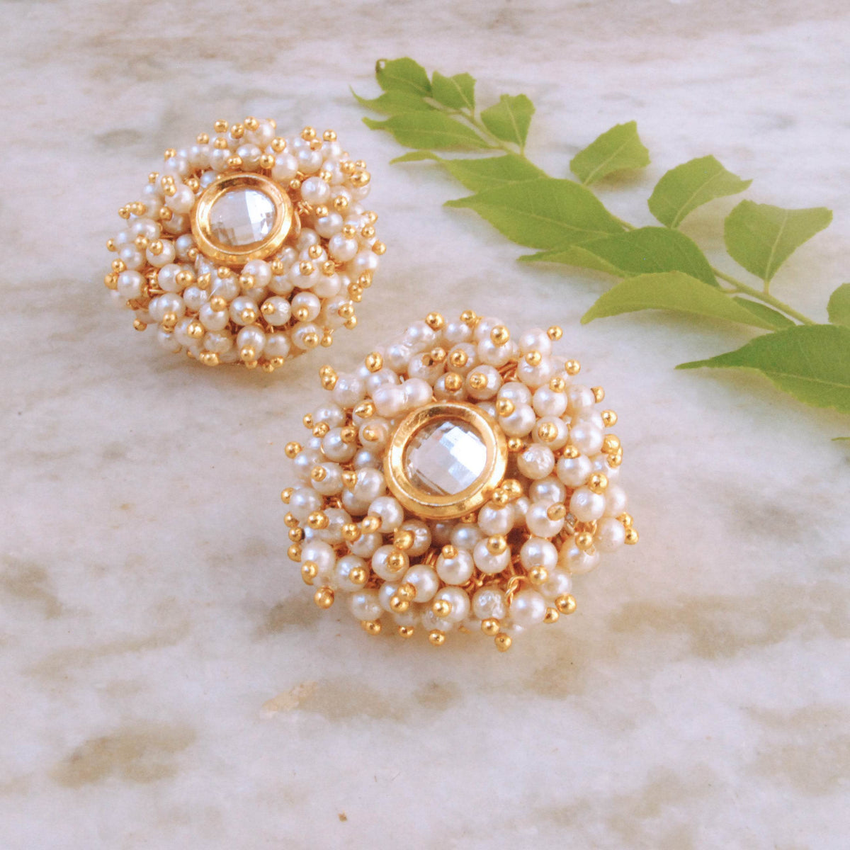 Traditional Kundan earrings in gold-tone, perfect for weddings and festive wear