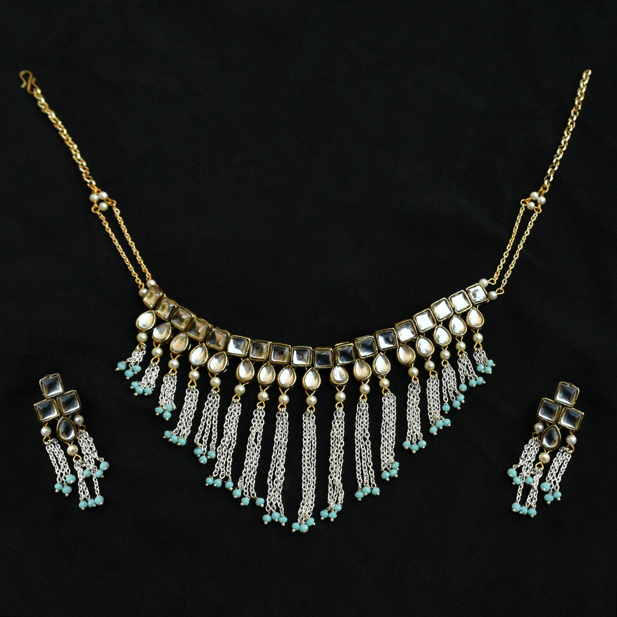 Kundan choker set in gold-tone with matching earrings and long bridal necklace, perfect for wedding functions , festive and bridal wear