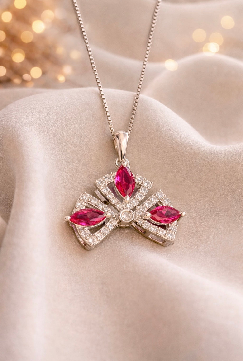 Royal Ruby Cross Pendant with Sparkling Accents