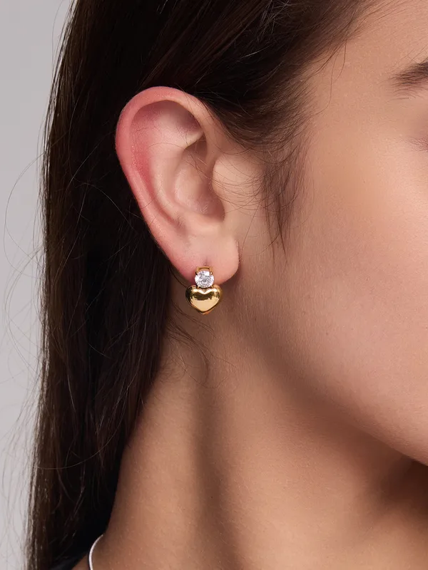 18k gold-plated heart stone earrings shown styled �? minimal heart-shape studs for everyday wear, gifting.