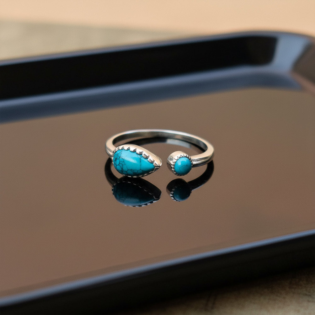 925 Silver Drop & round shaped Turquoise Ring in modern design handmade with bezel setting of stones.