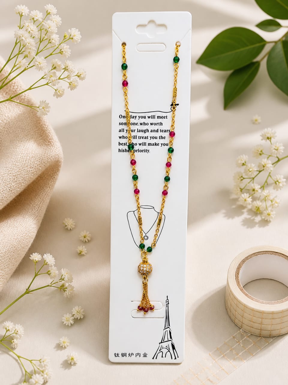 astria-emerald-ruby-tassel-mangalsutra