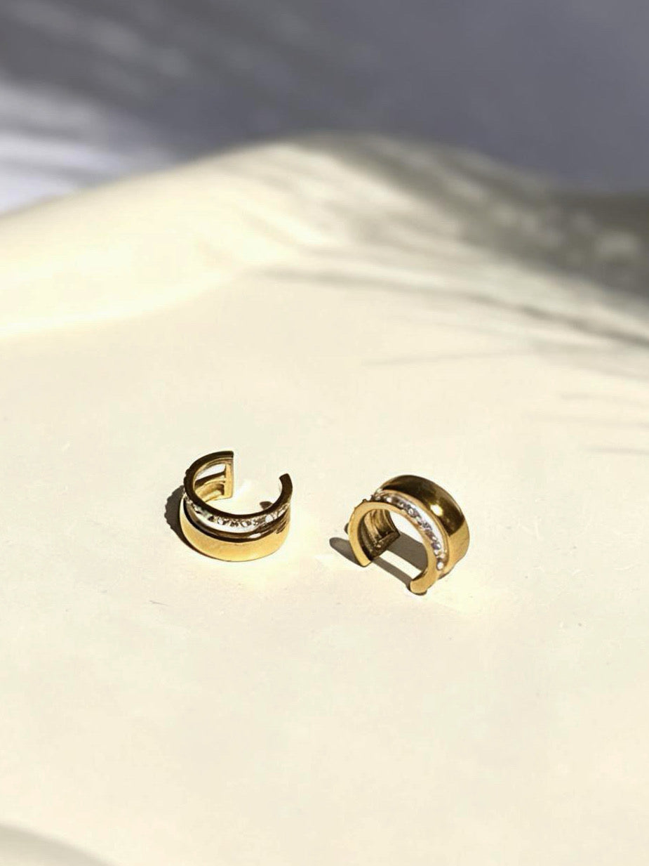 18k gold-plated Kiara ear cuff �? anti-tarnish, waterproof, hypoallergenic no-piercing single-piece cuff for stacks.