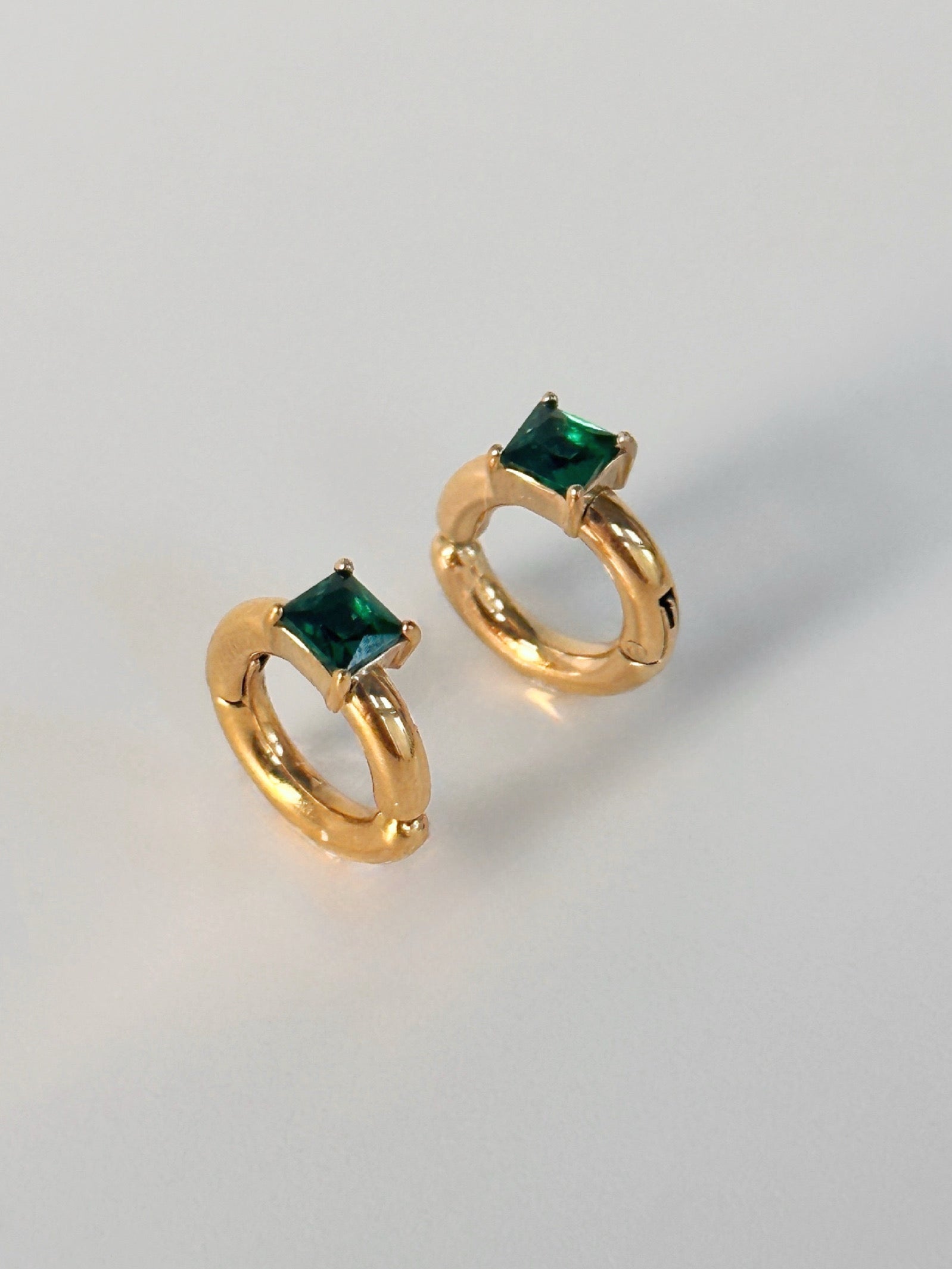 Styled view of Eshaa earring & ear cuff combo �? 18k gold-plated pair with no-piercing cuffs for festive looks.