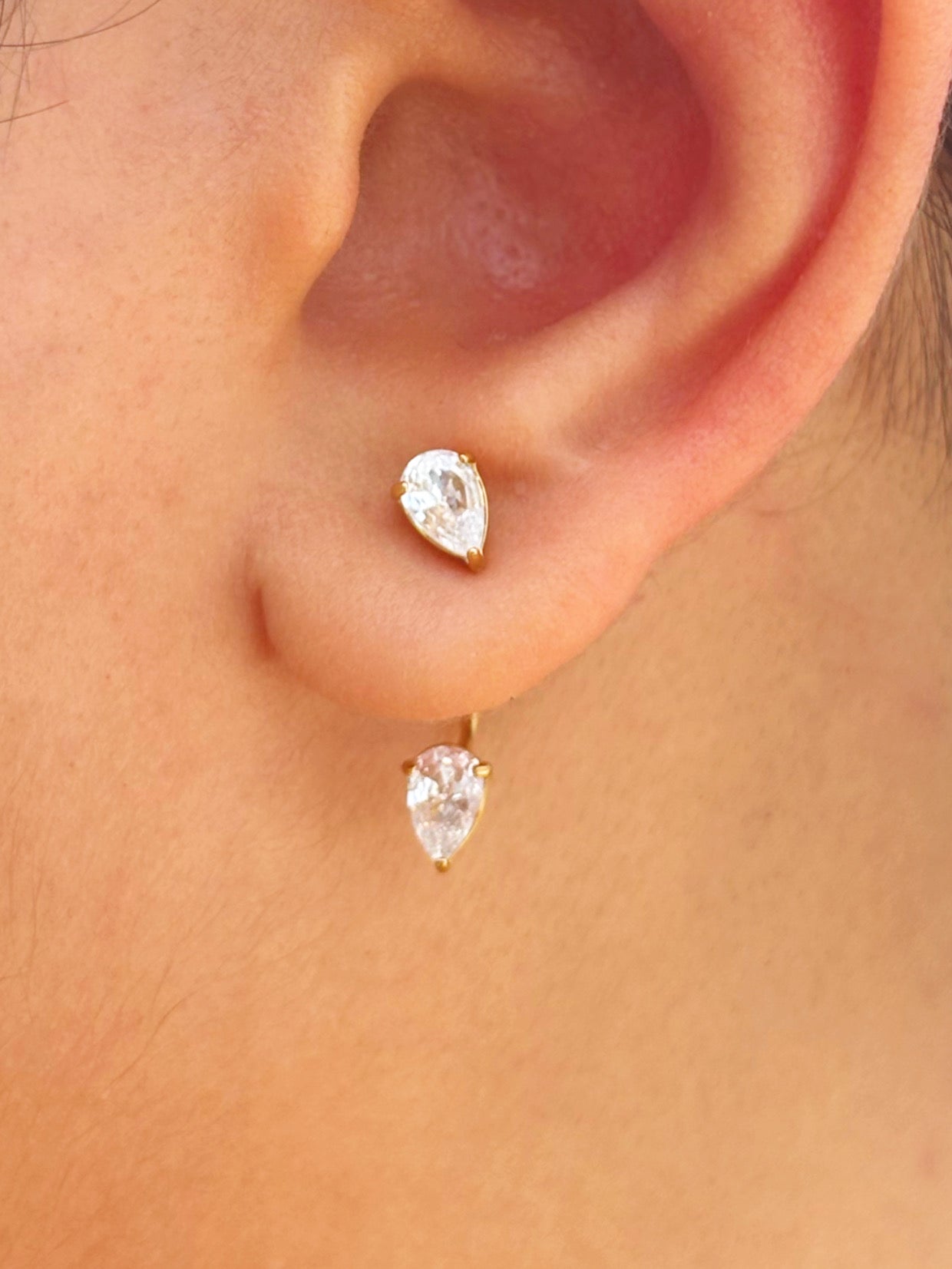 Styled view of Aanya earring & ear cuff combo �? 18k gold-plated pair with no-piercing cuffs for festive looks.