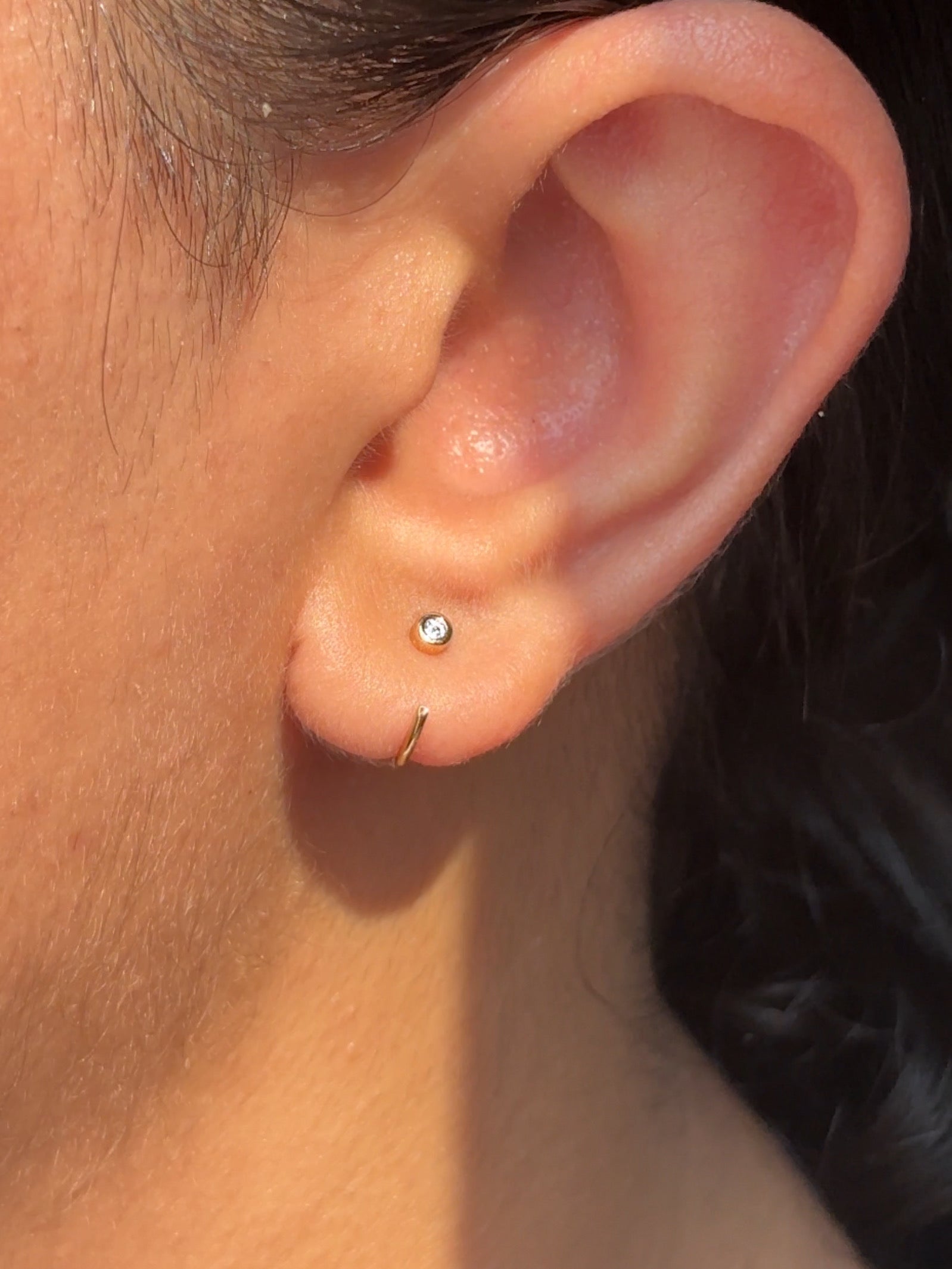 Pair of sterling silver stone hoop earrings �? poke-free hoops in gold and silver finish for kids and sensitive ears.