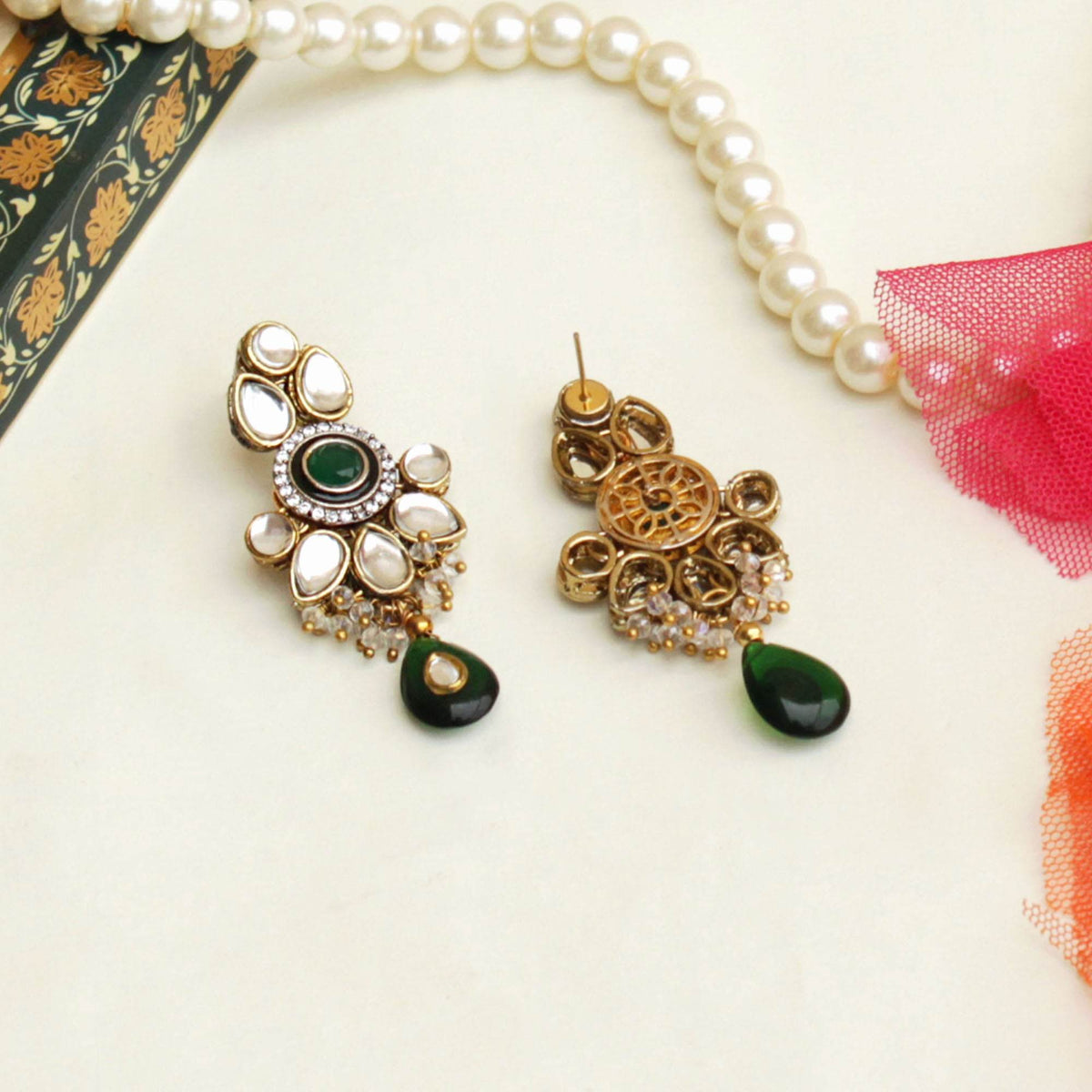 Traditional Kundan earrings in gold-tone, perfect for weddings and festive wear