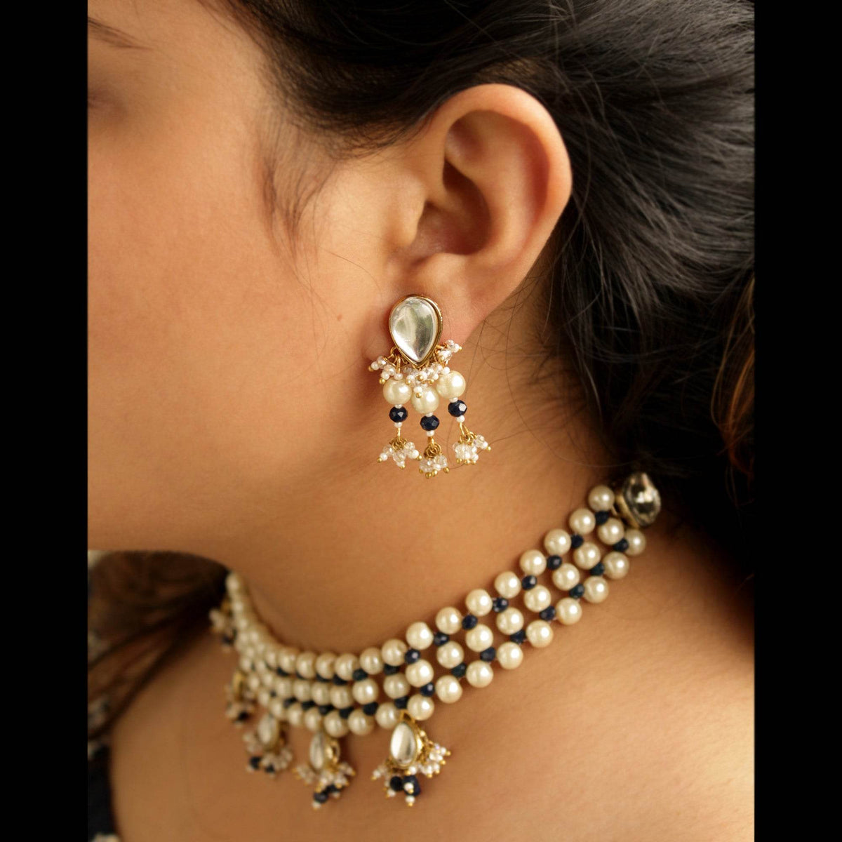 Traditional Kundan earrings in gold-tone, perfect for weddings and festive wear