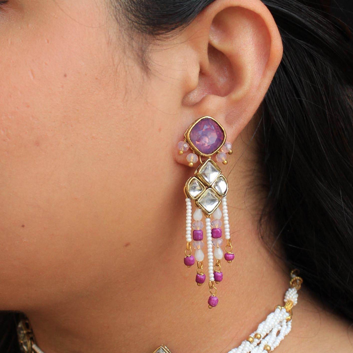 Traditional Kundan earrings in gold-tone, perfect for weddings and festive wear