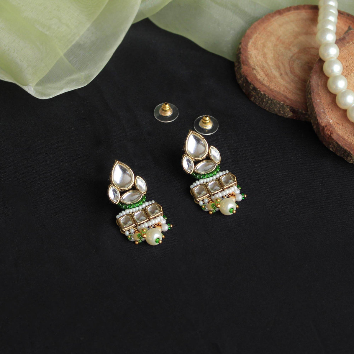 Kundan choker set in gold-tone with matching earrings and long bridal necklace, perfect for wedding functions , festive and bridal wear
