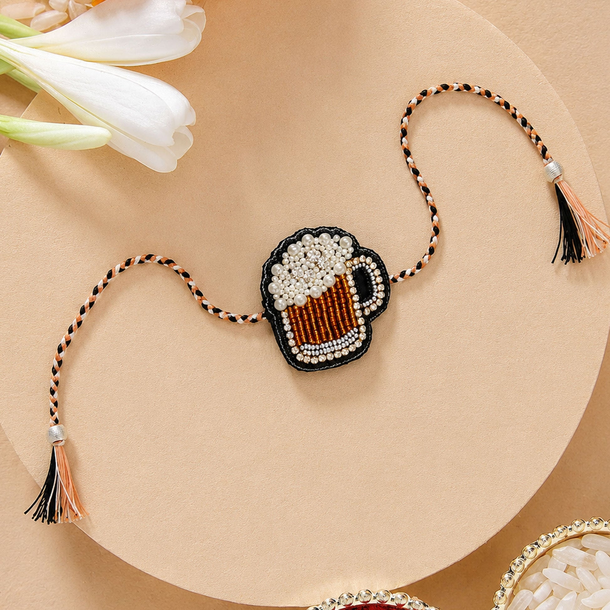 Black white beige braided thread rakhi with mug centerpiece