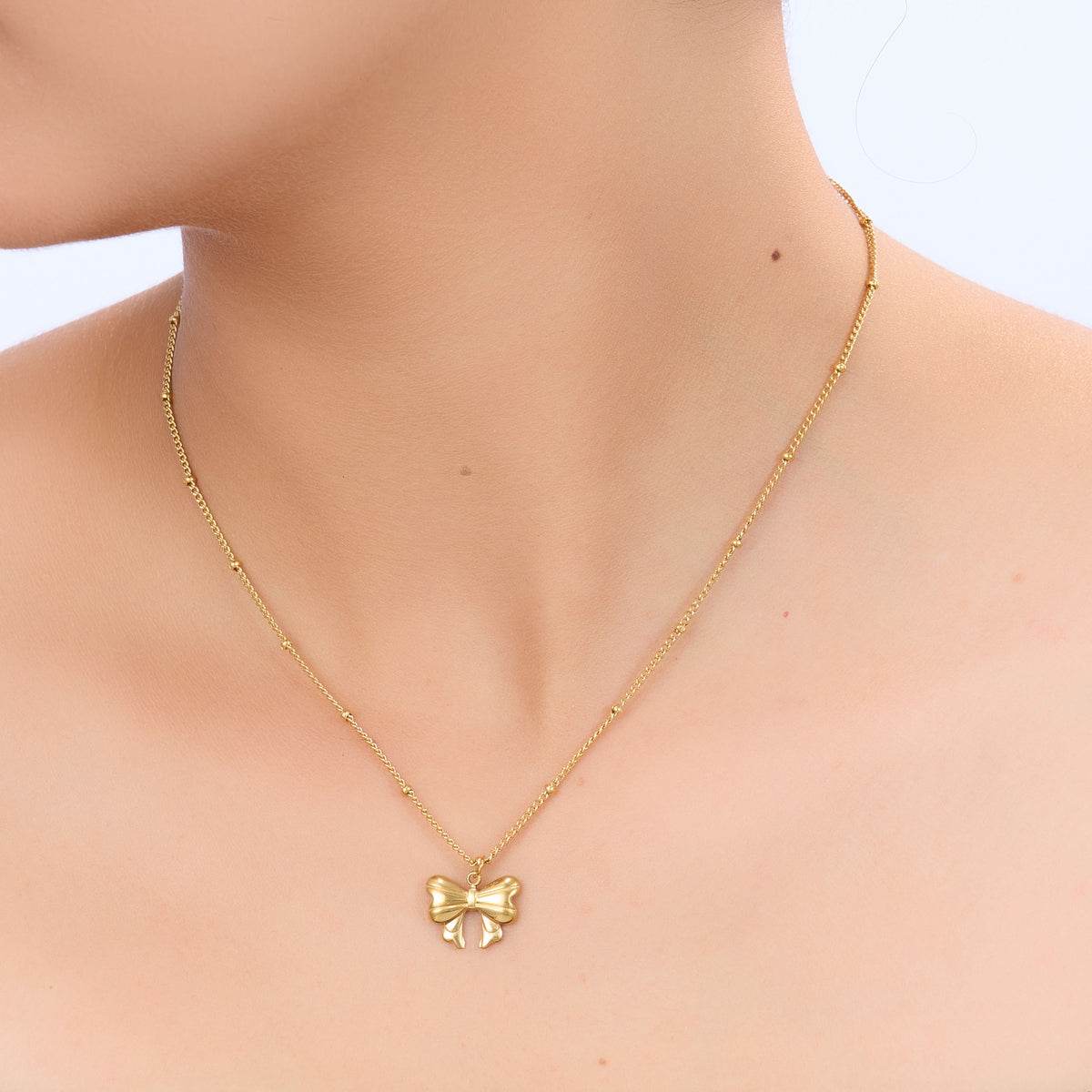 Sweet Bow Gold Pendant Necklace