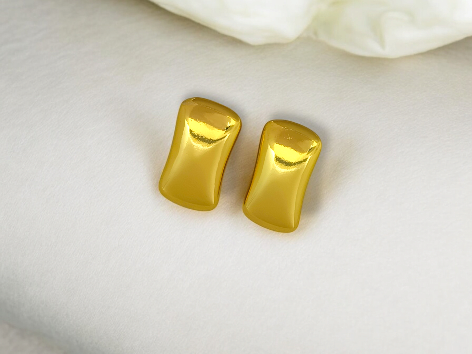 astria-jewellery-gold-plated-curved-rectangle-stud-earrings-for-women-modern-minimal-gloss-finish-chic-daily-wear-party-jewellery