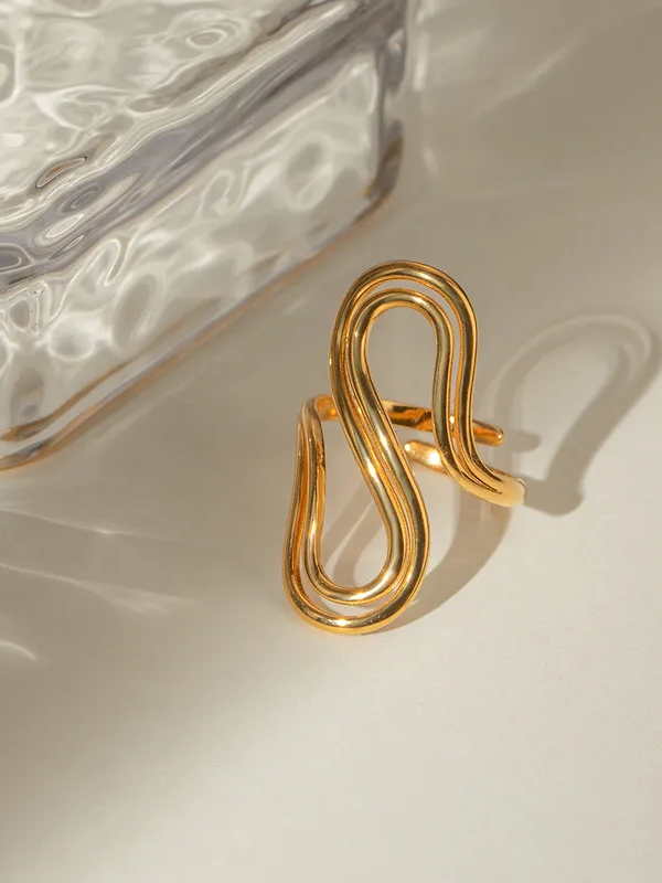 Detail shot of Twirl ring �? 18k gold-plated adjustable twirl-design ring for everyday and office wear.