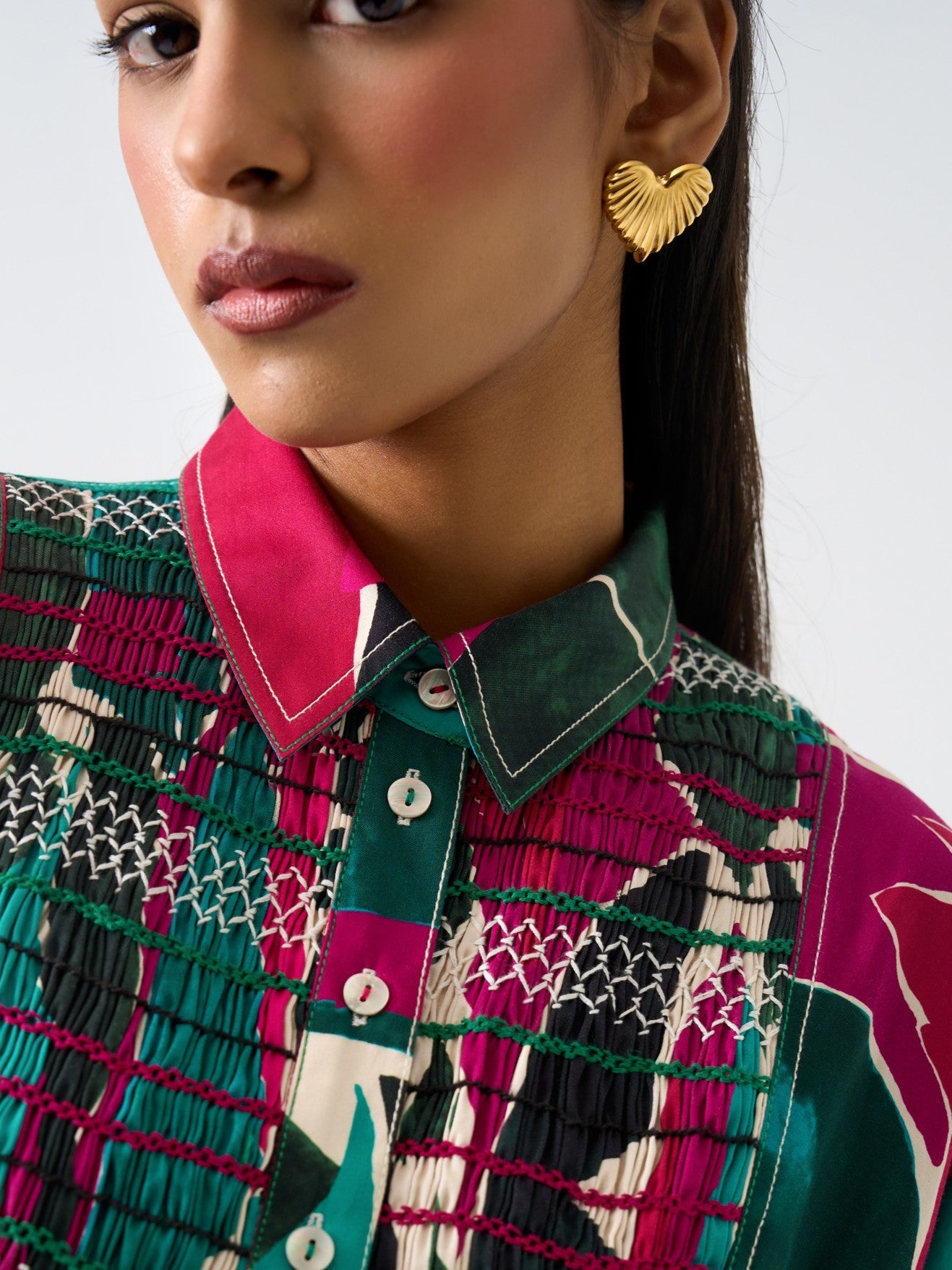 Styled view of heart studs �? 18k gold-plated sweet minimal heart stud earrings for everyday looks.