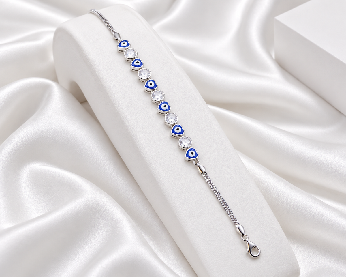 Silver Tone Blue Heart Evil Eye Bracelet with Clear Stones
