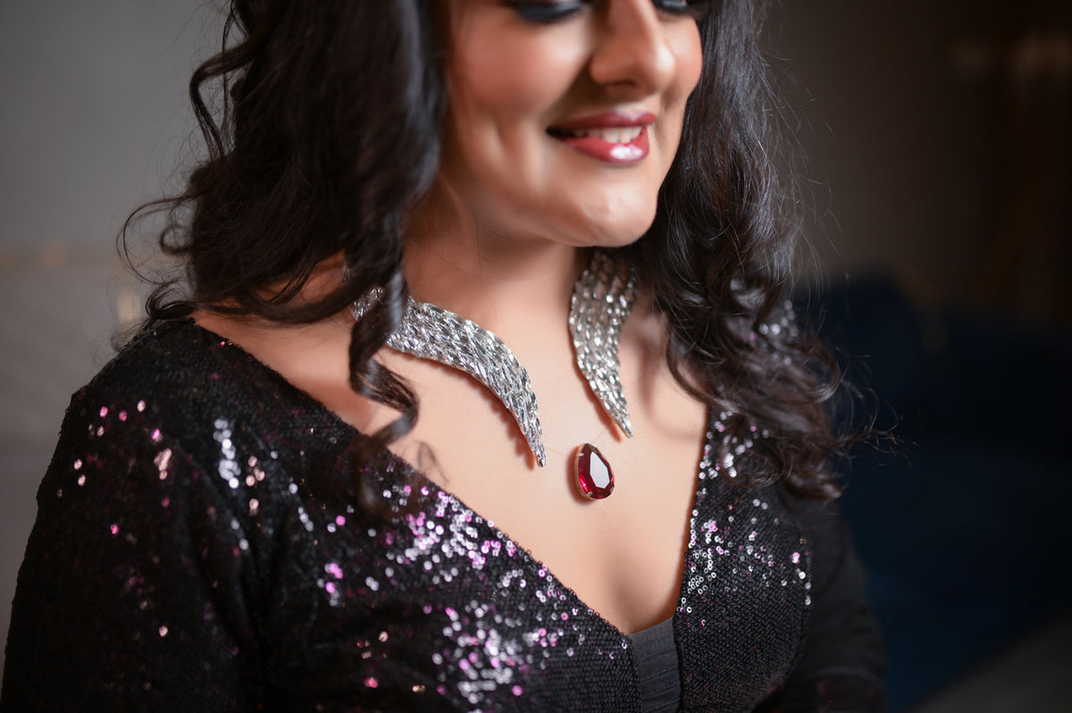 Celestial Flight: The Floating Pendant in Fuchsia