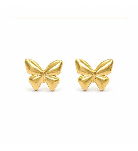 Gold butterfly stud earrings pair on white background