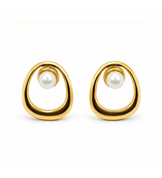 Gold pearl open oval stud earrings pair on white background