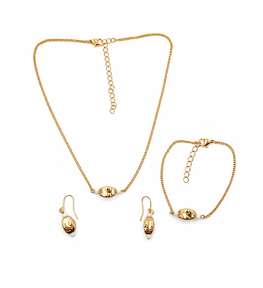Gold oval bead jewellery set with necklace bracelet and earrings on white background
