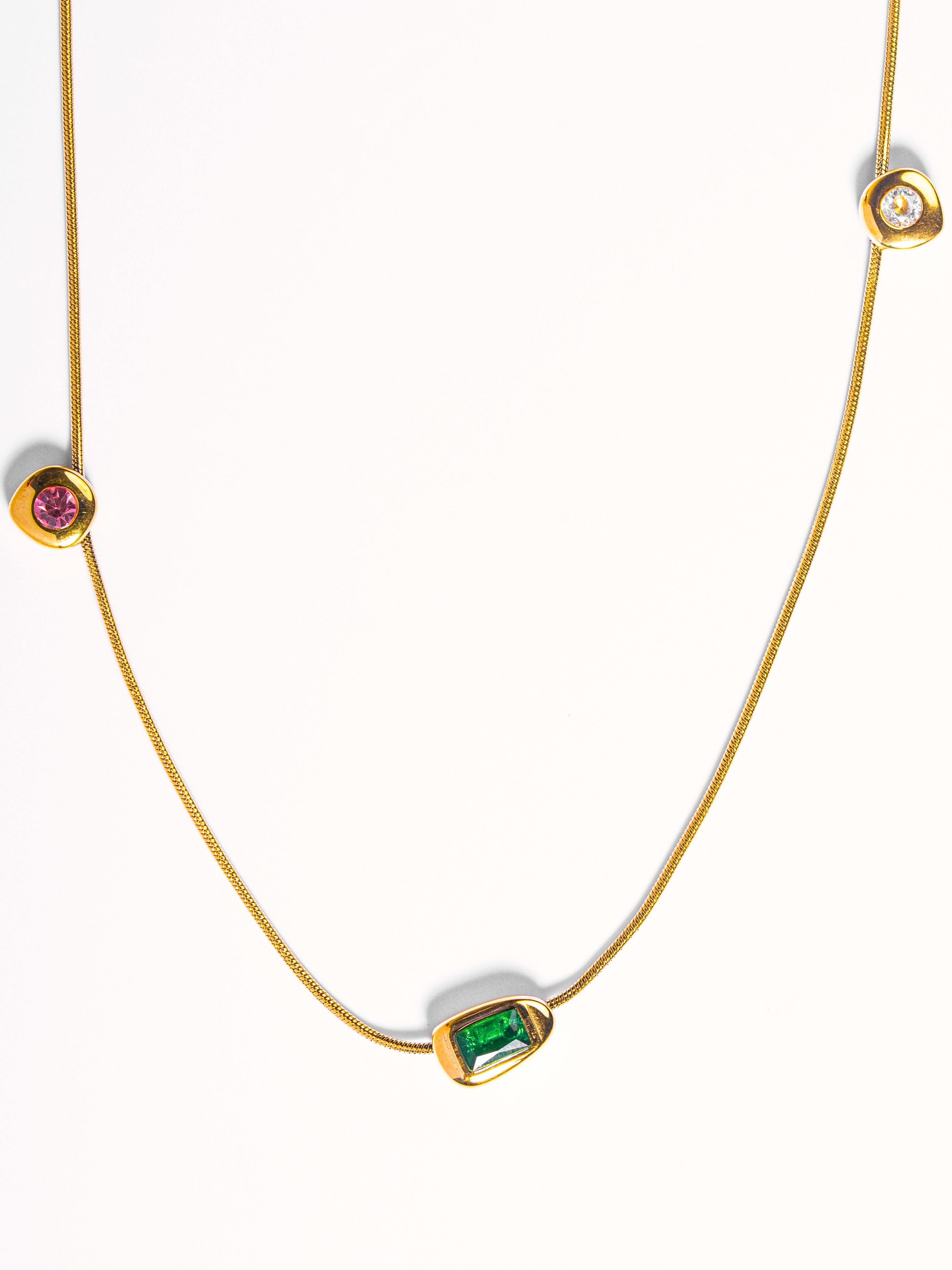 Styled view of Thaira pendant necklace �? 18k gold-plated stones pendant for everyday and gifting.